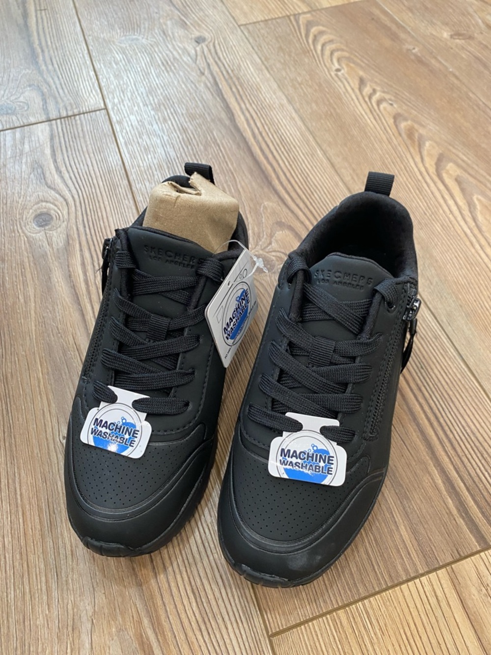 Skechers Black Sneakers with Tan Tongue Accent